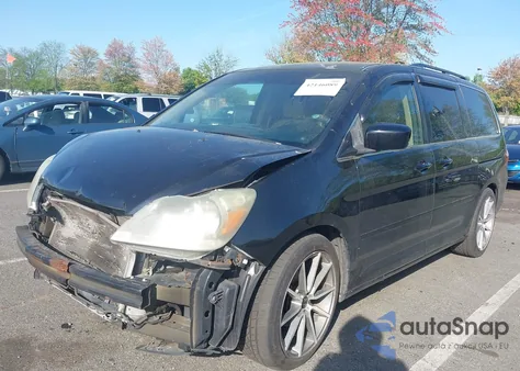 2007 Honda Odyssey Ex-L z USA, uszkodzony, nr VIN 5FNRL386X7B128430